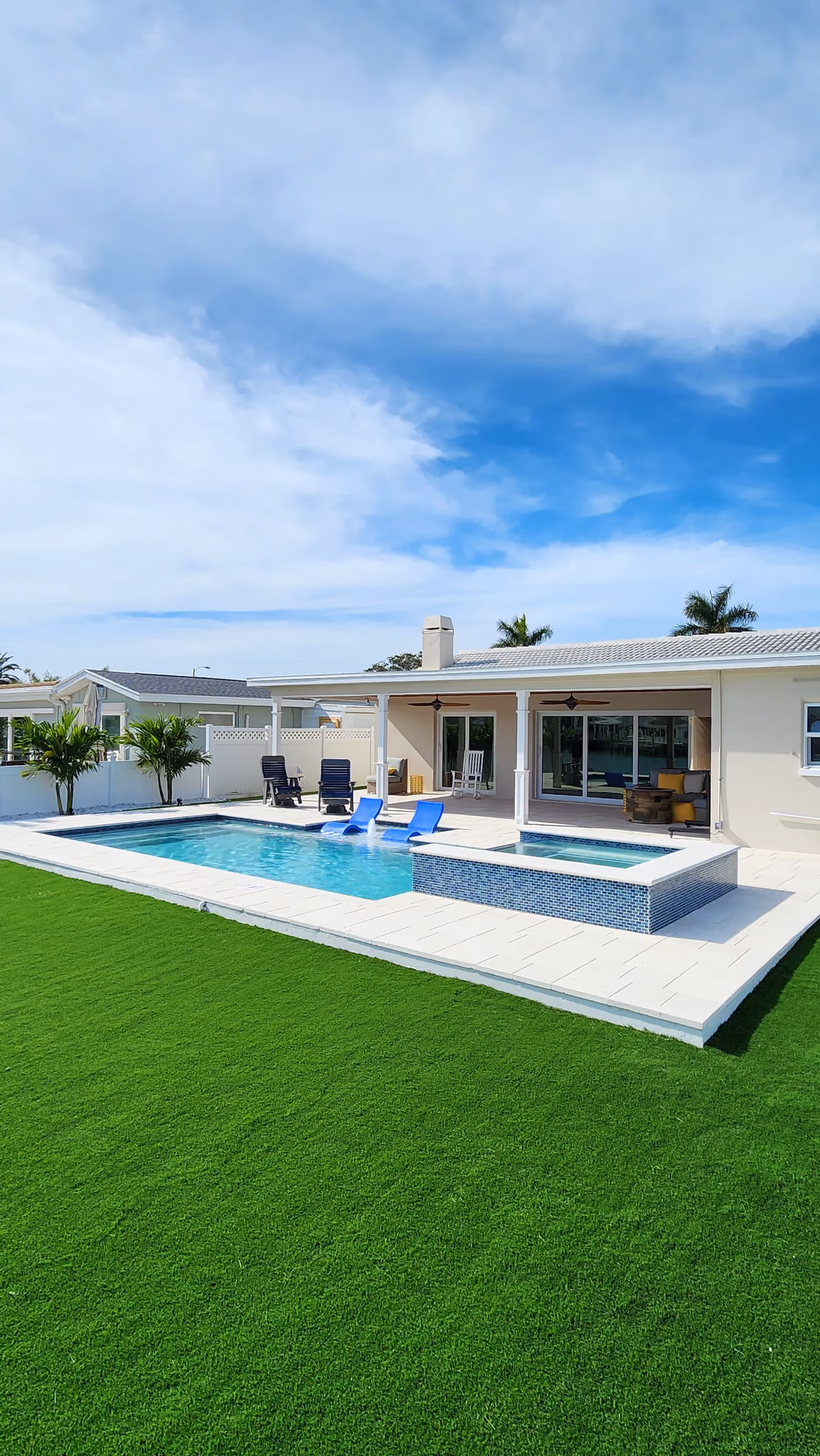 Custom concrete pool in a mature Lake Magdalene backyard