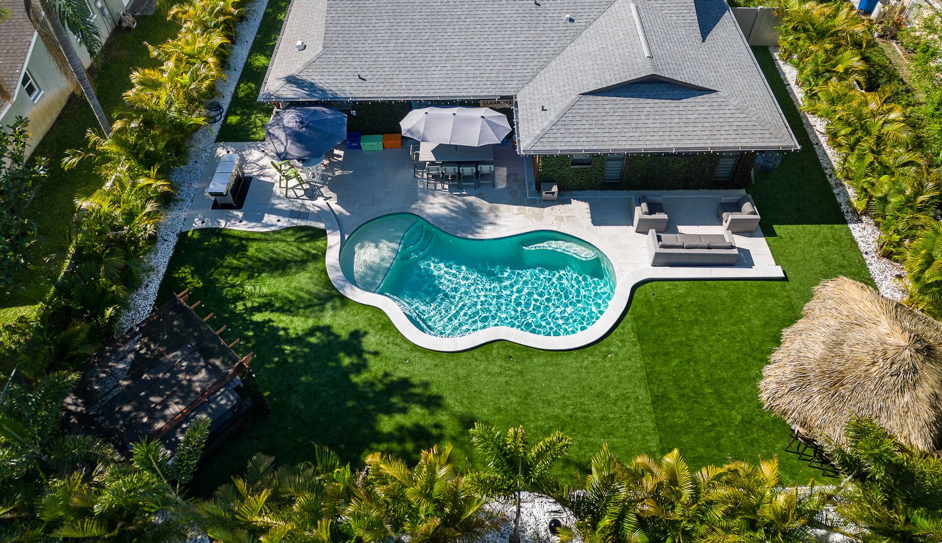 top view of house and swimming pool
