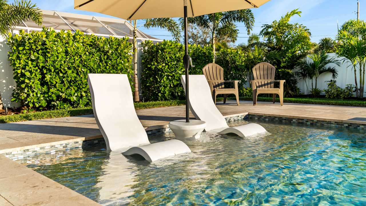 swimming pool with lounge chair