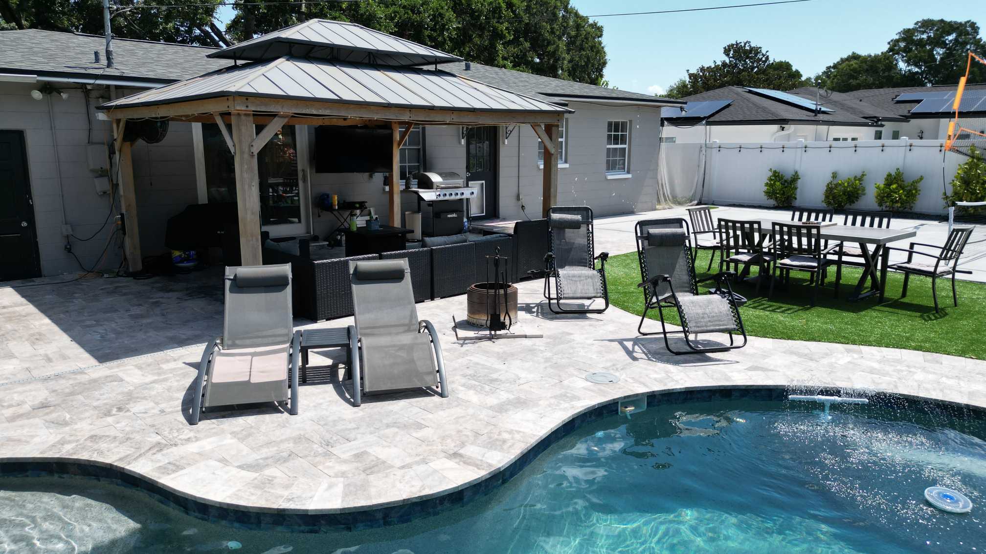 swimming pool with wood pergola