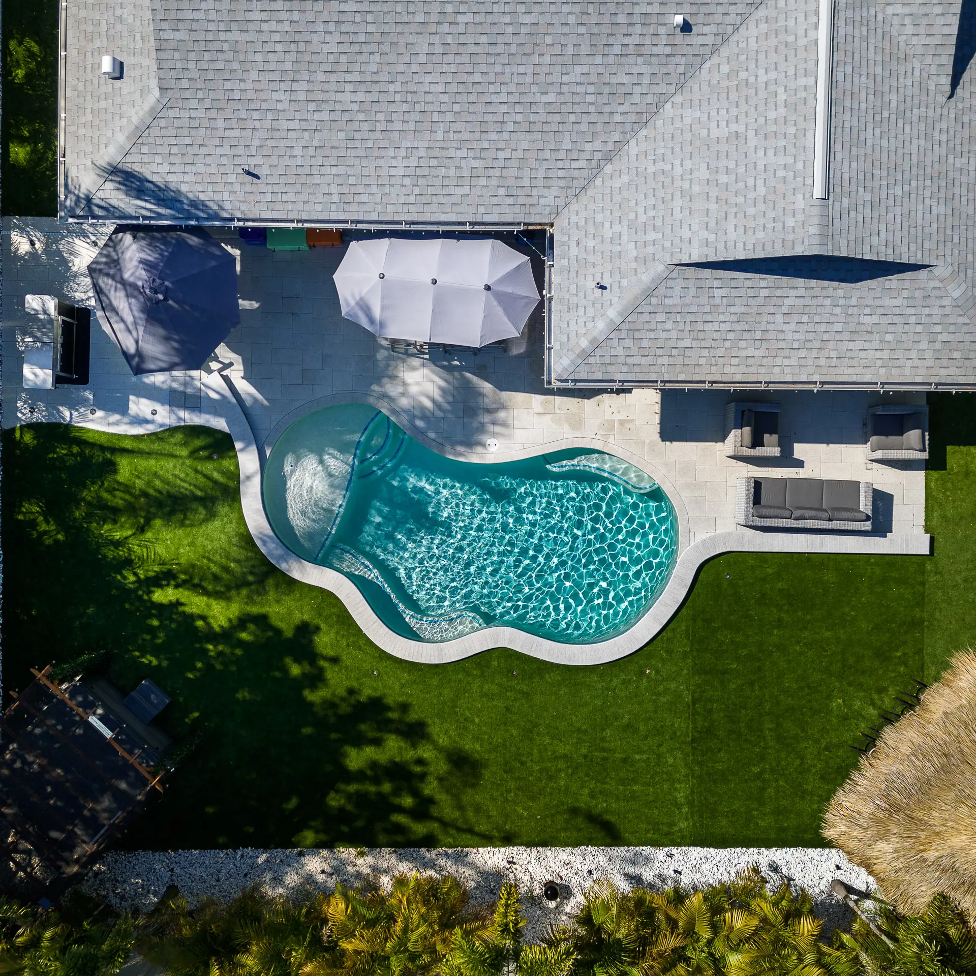 Aerial view of a finished concrete pool build in Tampa