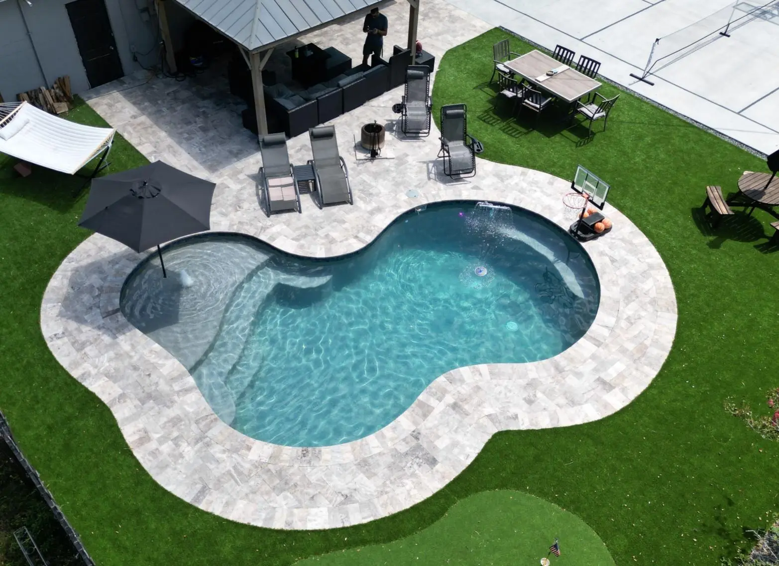Renovated concrete swimming pool after a Pool Perfection remodel in Tampa Bay